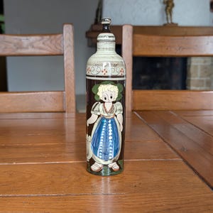 Kohler Biel vintage Swiss ceramic oil bottle with stopper hand-painted with girl and floral motif for rustic kitchen decor