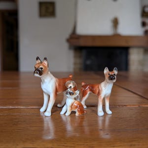 Boxer dog family figurine trio with glossy finish from Japan for canine collector or vintage shelf decor