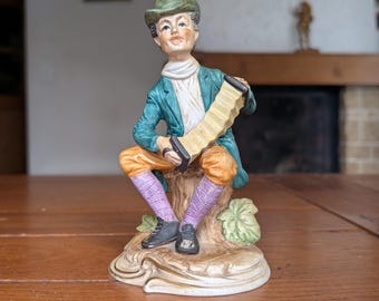 Vintage bisque porcelain figurine man with accordion rustic folk music decor