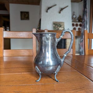 Vintage silver plated baroque water pitcher with BE markings from England