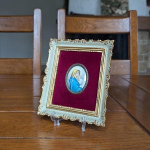 Antique French miniature portrait of Madonna and Child in oval with carved wood frame and red velvet backing for devotional wall decor