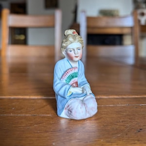 Vintage Hand-Painted Porcelain Figurine: Seated Asian Woman in Blue Kimono