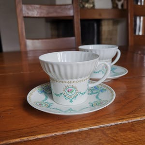 Imperial porcelain LFZ Lomonosov vintage pair cup and saucer of very fine bone porcelain made in the USSR