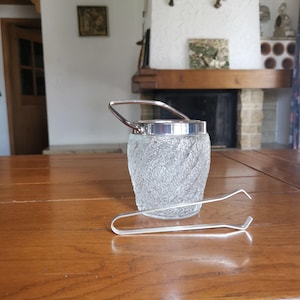 Vintage crystal ice bucket with handle and long tongs in pressed glass style for mid-century table settings or bar decor