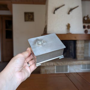 Vintage pewter trinket box with fish motif embossed lid rustic collectible jewelry storage
