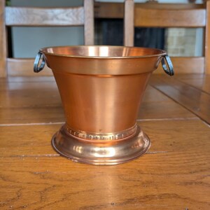 Stoeckli Swiss vintage copper ice bucket with side handles for chilling drinks and festive table serving from Switzerland