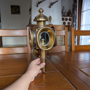 Brass carriage lantern with beveled glass panels for vintage vehicle restoration or steampunk home decor