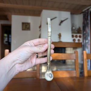 Alpaca vintage silver plated bombilla for drinking yerba mate, with intricate perforated filter and curved handle