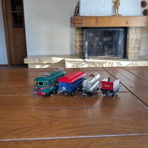 Hornby Hachette 0 Gauge vintage pewter toy train cars set of cars locomotive, passenger, fuel tank, open freight for collectors from France