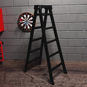 May include: A black step ladder stands on a wooden floor against a gray brick wall. A dartboard hangs on the wall to the left of the ladder. A red tool chest is visible on the left side of the image.