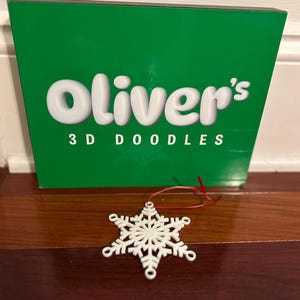 Adorno de copo de nieve impreso en 3D