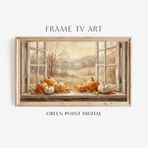 May include: A digital artwork titled FRAME TV ART by GREEN POINT DIGITAL featuring a landscape painting of orange and white pumpkins on a wooden windowsill looking out onto an autumn field with trees through an open window frame.
