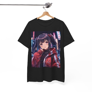 May include: Black t-shirt featuring an anime-style illustration of a girl with dark hair in pigtails, wearing a red jacket. The background shows a city scene with neon signs. The shirt is hanging on a wooden hanger.