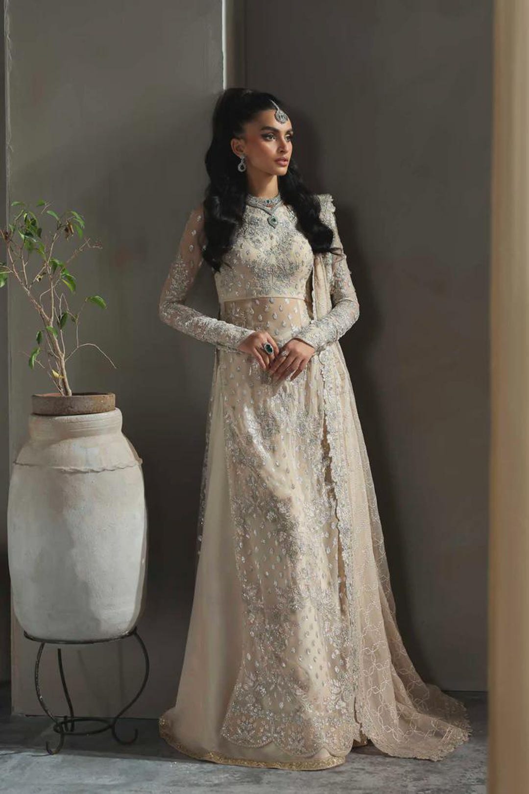 nikkah dress white  Asma and Shumaila The heavily decorated top is paired with a spectacular wide Hijabi Bride in Maxi Nikkah