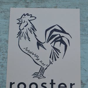 Tarjeta didáctica de fonética de la década de 1950 con imagen grande: gallo