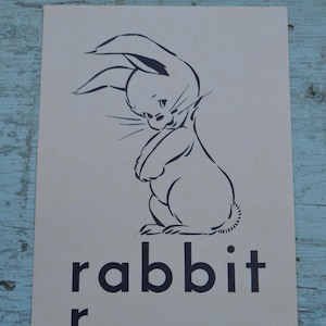 Carte flash vintage avec photos éphémères, grand lapin des années 1950