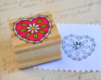 Op harthout gemonteerde rubberen stempel