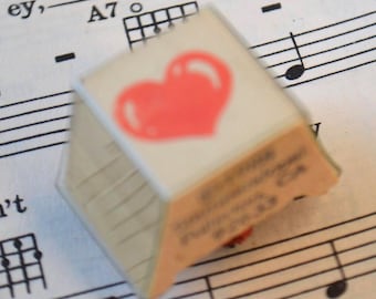 Op harthout gemonteerde rubberen stempel