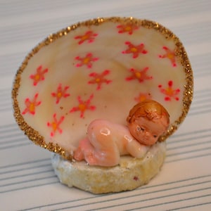 Vintage Decorated Miniature Baby in a Shell Figurine