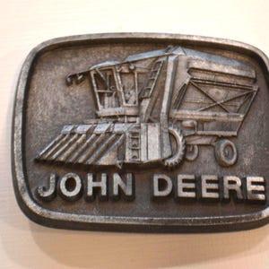 Vintage Silver Metal John Deere and Co. 1980 Combine Belt Buckle