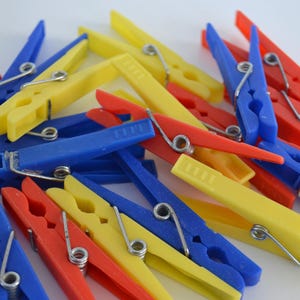 Assorted Colorful Red Yellow Blue Plastic Clothespins Lot of 22
