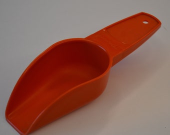 Cuchara de cocina de plástico naranja Tupperware vintage