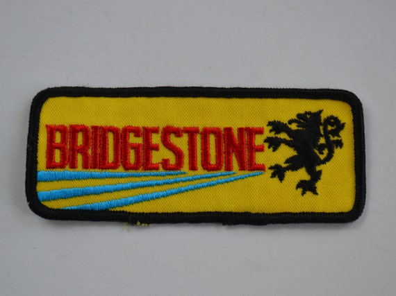 Vintage Bridgestone Embroidered Yellow Blue Black… - image 1