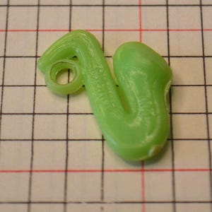 Vintage Plastic Green Saxophone Horn Instrument Jewelry Charm