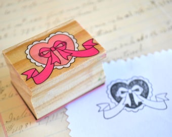 Op harthout gemonteerde rubberen stempel