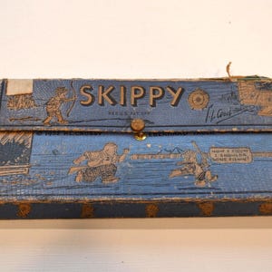 Estuche para lápices de cartón para niños Skippy Kids de R.L. Crosby, antiguo y desgastado, de 1932