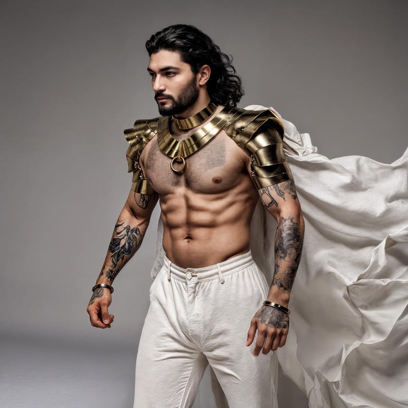 May include: A gold-colored metallic shoulder and neck armor piece featuring layered plates and a central ring detail, worn with white trousers and a flowing white cape. The armor covers the upper chest and shoulders with a structured, reflective finish.