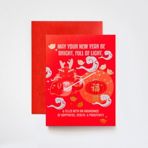Carte de voeux de joyeux nouvel an lunaire de dragon porte-bonheur