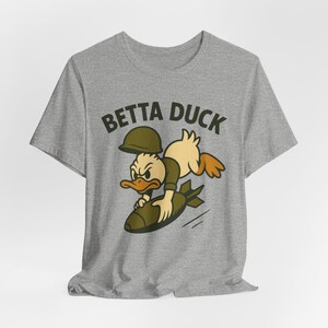 Betta Duck Bomb Rider T-Shirt: Retro Cartoon Military Nose Art Style image 11