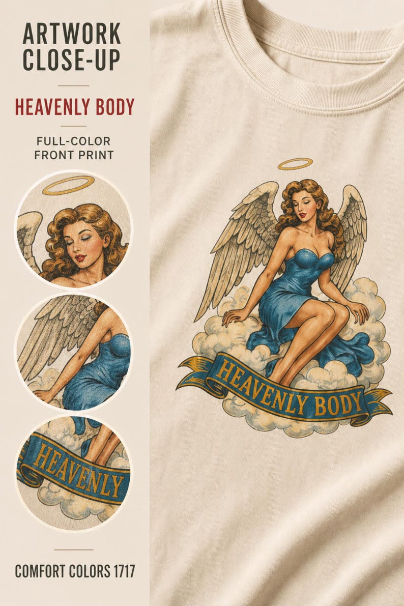 May include: A cream-colored t-shirt featuring a graphic print of an angel with wavy brown hair, large wings, and a blue dress, sitting on clouds. Below the angel is a blue banner with the text HEAVENLY BODY in gold letters. The image includes close-up circular insets.