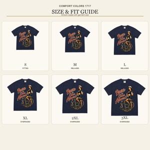 Op de afbeelding: Een maattabel voor een marineblauw t-shirt met een afbeelding van een pin-up zeeman en de tekst Permission to Come Aboard! De tabel toont zes maten van S tot 3XL en laat zien hoe het ontwerp schaalt op het Comfort Colors 1717 kledingstuk.