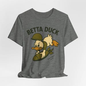 Betta Duck Bomb Rider T-Shirt: Retro Cartoon Military Nose Art Style image 8