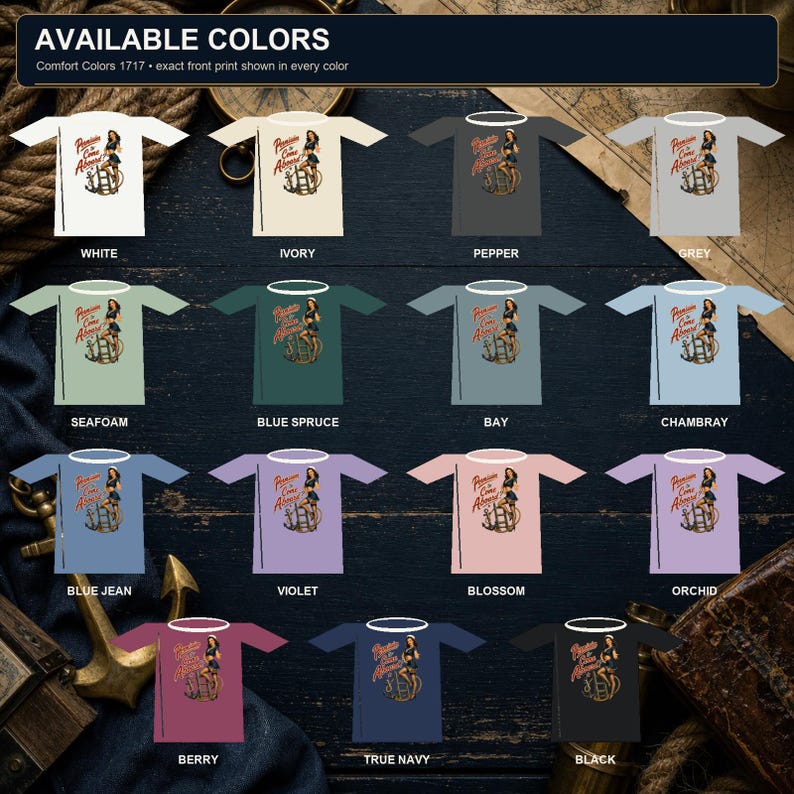 Op de afbeelding: Een collectie van vijftien t-shirts in diverse kleuren waaronder wit, ivoor, peper, grijs, zeeschuim, blauwspar, baai, chambray, blue jean, violet, bloesem, orchidee, bes, marineblauw en zwart, elk voorzien van een pin-up afbeelding en tekst.