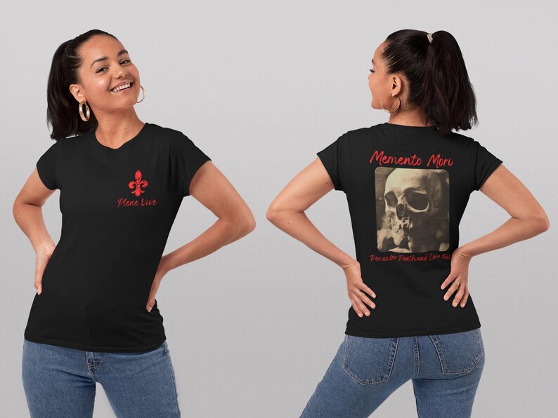 May include: Black t-shirt with a red fleur-de-lis and the words "Plene Live" on the front. The back of the shirt features a skull image with the words "Memento Mori" and "Remember Death and Live Fully".