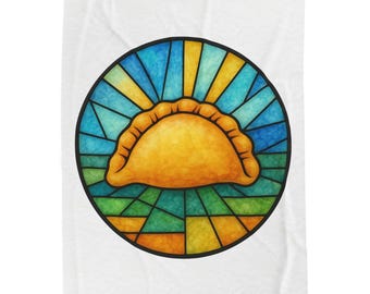 May include: A round, stained-glass style design featuring a golden-yellow empanada in the center. The empanada is surrounded by a circular frame with blue, green, and yellow geometric shapes, set against a white background.