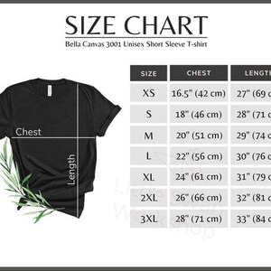 May include: A black Bella Canvas 3001 unisex short sleeve t-shirt with a size chart. The chart shows chest and length measurements in inches and centimeters for sizes XS to 3XL. The shirt has a sprig of green leaves.