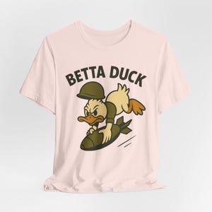 Betta Duck Bomb Rider T-Shirt: Retro Cartoon Military Nose Art Style image 6