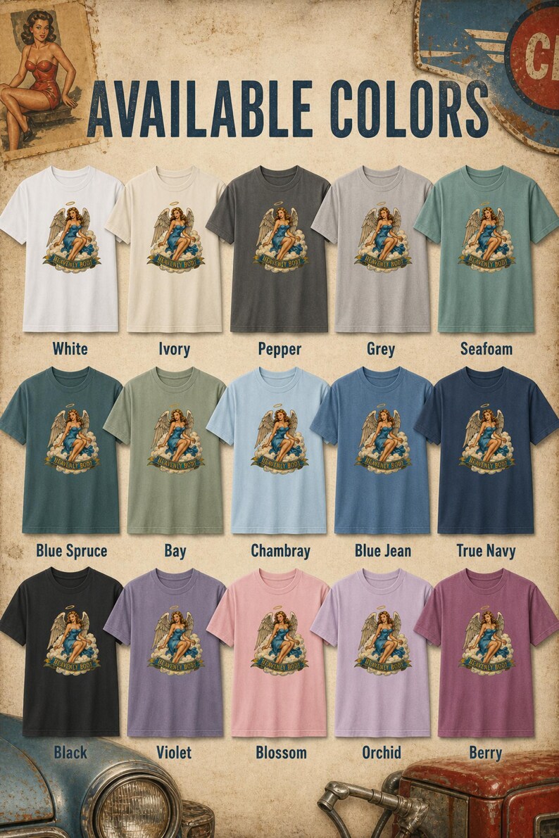 May include: A collection of fifteen short-sleeve t-shirts in various colors, each featuring a graphic of an angel with the text 'HEAVENLY BODY'. The colors include white, ivory, pepper, grey, seafoam, blue spruce, bay, chambray, blue jean, true navy, black, violet, blossom, orchid, and berry.
