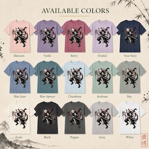 May include: A collection of fifteen short-sleeve t-shirts in various colors, each featuring a graphic print of a masked warrior figure holding a sword in front of a red circle and black brushstroke text. The colors include blossom, violet, berry, orchid, true navy, blue jean, blue spruce, chambray, seafoam, bay, ivory, black, pepper, grey, and white.