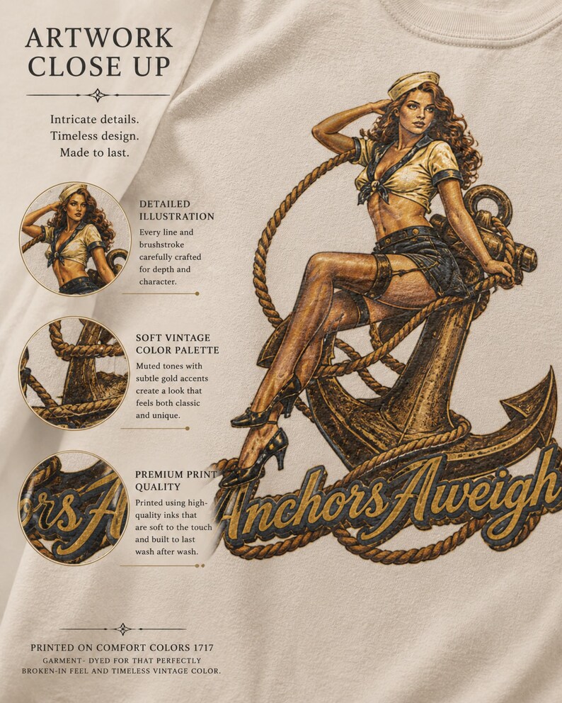 May include: A beige t-shirt featuring a detailed illustration of a person in a sailor-style outfit sitting on a large anchor. The graphic includes the text Anchors Aweigh in a dark script font, surrounded by rope details and descriptive text labels.