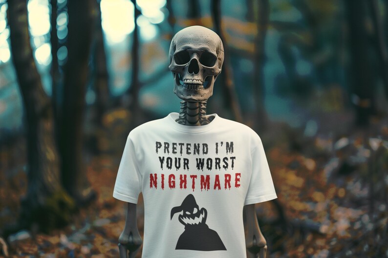 May include: A skeleton wearing a white t-shirt with the words "PRETEND I'M YOUR WORST NIGHTMARE" in black and red. A black silhouette of a character is below the text. The background is a blurred forest scene.
