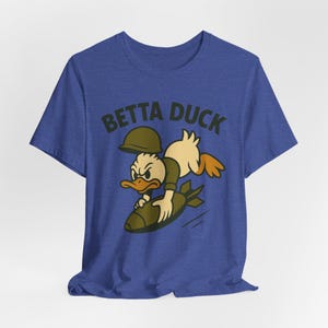 Betta Duck Bomb Rider T-Shirt: Retro Cartoon Military Nose Art Style image 13