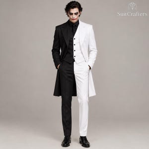 May include: A split-color suit featuring a black jacket, vest, and trousers on the left side and a white jacket, vest, and trousers on the right side. The ensemble includes a black tie and black dress shoes. The text SuitCrafters is visible.
