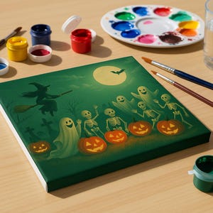 May include: A Halloween-themed canvas art print featuring a witch on a broom, ghosts, skeletons, and jack-o'-lanterns under a full moon. Paint pots, brushes, and a palette with various colors are arranged around the artwork on a wooden surface.