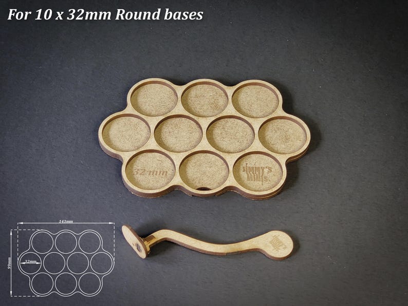 May include: A wooden tray with ten circular cutouts, labelled "32mm" and "Jimmy's Minis", and a matching handle. The tray is designed to hold round bases. The text "For 10 x 32mm Round bases" is at the top.