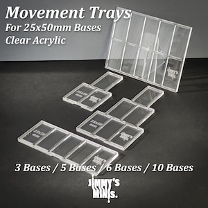 May include: Clear acrylic movement trays for miniature bases. Designed for 25x50mm bases. Available in configurations for 3, 5, 6, and 10 bases. The trays are labelled with the text "Movement Trays" and "Jimmy's Minis."